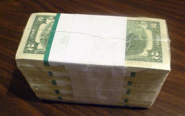 1000 United States two-dollar bills in shrink wrap